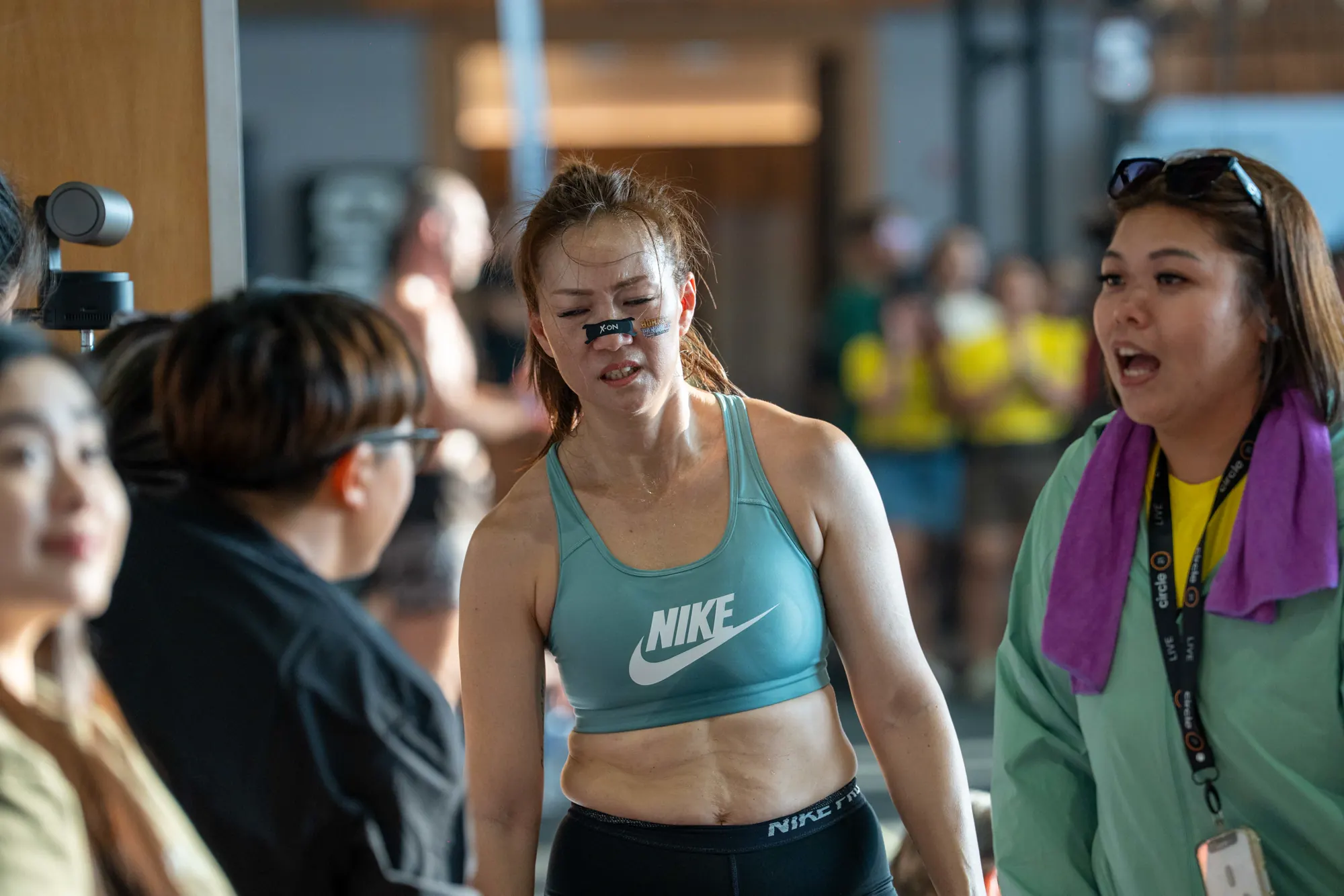 Competitors recovering together between heats