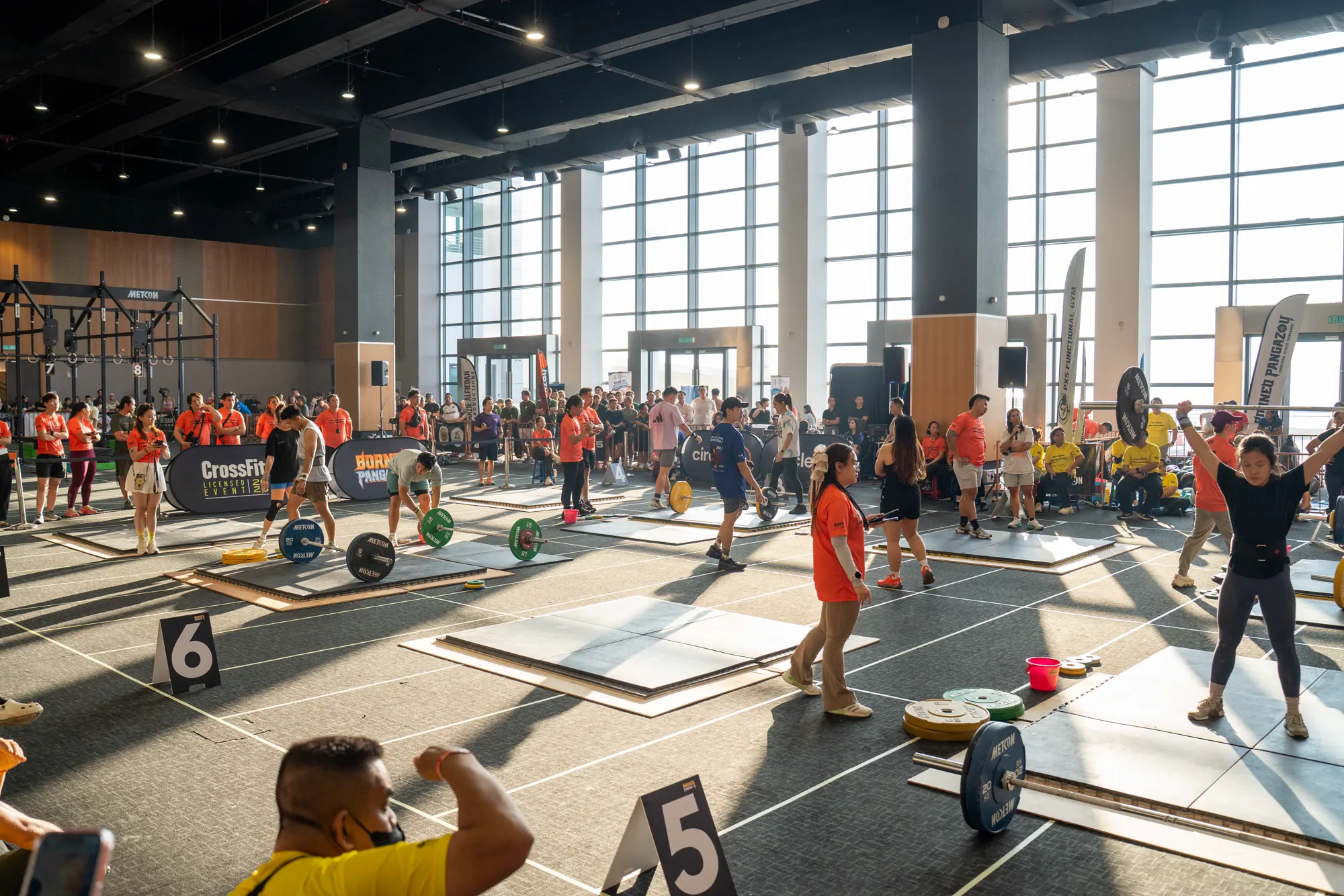 Wide arena view during a Day 2 heat