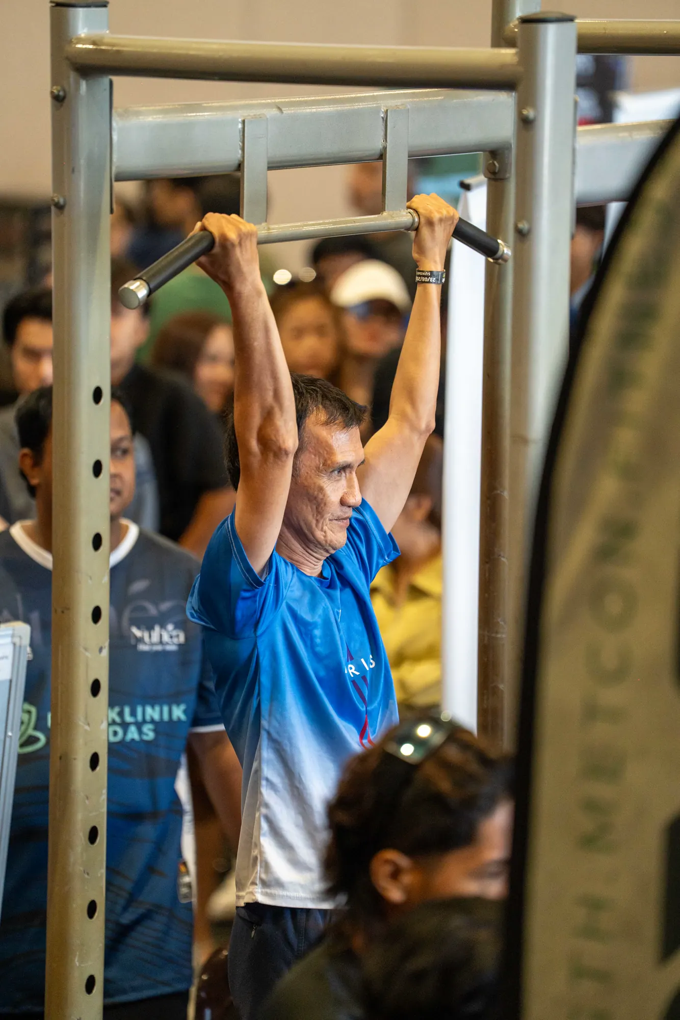 Athlete completing a movement on the rig